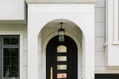 トロントにあるトランジショナルスタイルのおしゃれな家の外観 (石材サイディング、デュープレックス) の写真