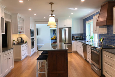 Example of a large beach style kitchen design in Portland Maine