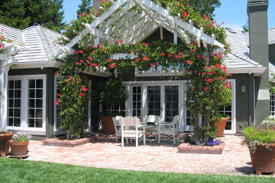 Patio - traditional brick patio idea in San Francisco