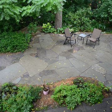irregular blue stone patio for perinnial garden