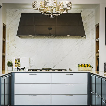 Transitional Beaux-arts kitchen with black cabinets