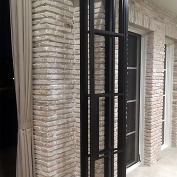 Panoramic Accordion :Patio Doors in a Bronze Metal Frame & Insulated Glass Panes