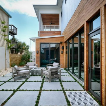 clé cement in the spotlight at contemporary florida beach home