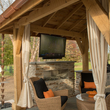 Outdoor TV under pergola