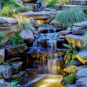 CREATING A HILLSIDE WATERFALL WITH STONE TERRACES