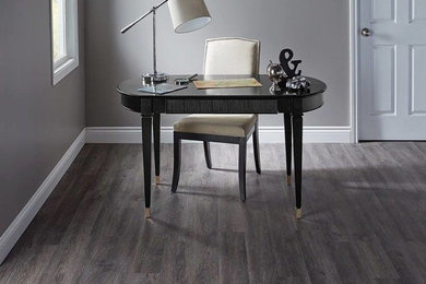 Inspiration for a dark wood floor home office remodel in Other