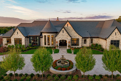 Example of a french country exterior home design in Minneapolis