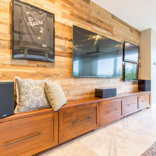 Inspiration for a large enclosed home cinema in Austin with grey walls, porcelain flooring, a wall mounted tv and grey floors.