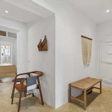 Circulation Area with Wood Bench and Wall Pieces
