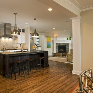 Traditional Kitchen with White Cabinets and Dark Island