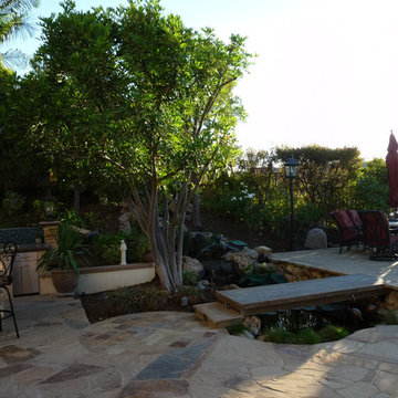 Multi-Tiered Stone and Tile Backyard Retreat