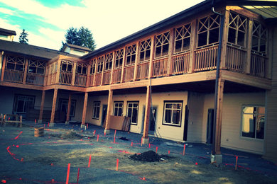 Inspiration for a large craftsman beige two-story concrete fiberboard exterior home remodel in Seattle