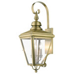 Livex Lighting Inc. - 3 Light Antique Brass Outdoor Large Wall Lantern, Brushed Nickel - The stylish antique brass finish outdoor Adams large wall lantern is a great way to update your home's exterior decor. A flat metal curved arm attaches the solid brass decorative housing to the square backplate while clear glass shows off the brushed nickel finish cluster.