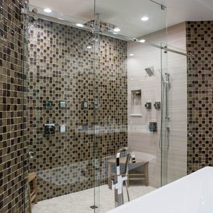 Bathroom - large contemporary master beige tile, brown tile and mosaic tile dark wood floor bathroom idea in Miami with a two-piece toilet and beige walls