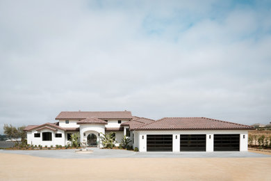 Example of a tuscan exterior home design in San Luis Obispo