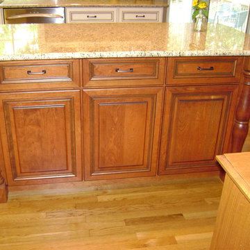 Traditional White Kitchen with Contrasting Cherry Island in Occoquan, VA