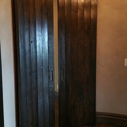 Unique Curved Custom Reclaimed Wood Barn Doors in a Traditional Room - Interior Doors