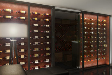 Design ideas for a large modern wine cellar in London with slate floors and storage racks.