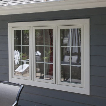 Shiny new Andersen Windows, Evening Blue James Hardie siding & stone accents