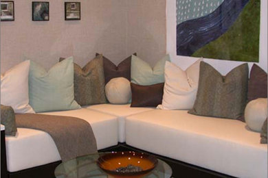 Inspiration for a mid-sized tropical formal and enclosed carpeted living room remodel in San Francisco with beige walls, no fireplace and no tv