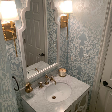 Before & After : A Blue & White Powder Room w/ Whimsical Wallpaper