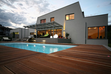 Example of a minimalist exterior home design in Other