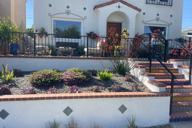 SPANISH REVIVAL FRONT YARD