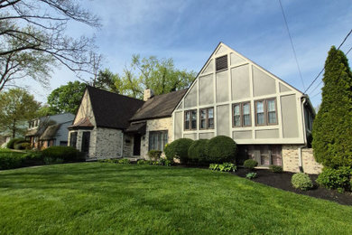 Example of a french country home design design in Philadelphia