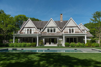 Beach style pool photo in New York