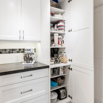 Condo White Galley Kitchen