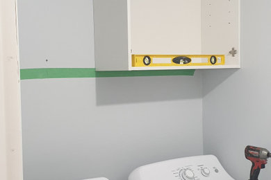 Laundry room - laundry room idea in Vancouver