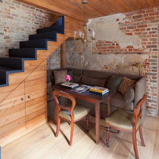 Inspiration for an eclectic painted wood l-shaped staircase in Charleston with painted wood risers.