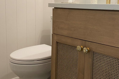 Inspiration for a transitional powder room remodel in Cleveland