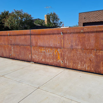 Gorgeous Corten Bi-Fold Security Gates - for wide driveway