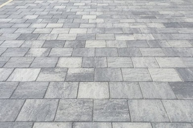 Recoating paving