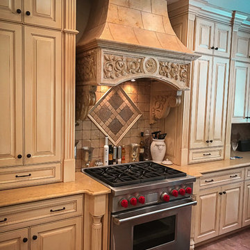 Custom Installation of Travertine Wall Hood & Wolf Range