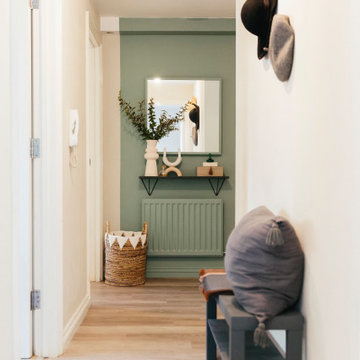 Soothing green, colour-blocked hallway