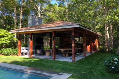 Patio - large transitional backyard patio idea in New York