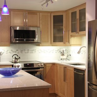 Small contemporary kitchen pantry designs - Example of a small trendy l-shaped ceramic floor kitchen pantry design in Ottawa with a double-bowl sink, recessed-panel cabinets, medium tone wood cabinets, granite countertops, white backsplash, ceramic backsplash, stainless steel appliances and an island