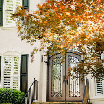 An Eye-Catching Exterior: Ornate Double Iron Doors