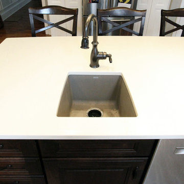 White Kitchen with Espresso Island and Eternia Caringdale Quartz Countertop