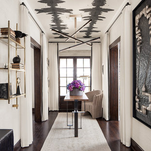 Inspiration for a mid-sized eclectic entry hall in Chicago with white walls and dark hardwood floors.