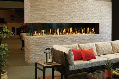 Living room - contemporary living room idea in San Luis Obispo with a two-sided fireplace