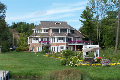 Coastal exterior home idea in Other
