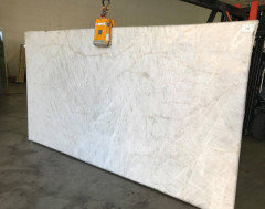 delicatus granite to white grey cabinets with calacatta floor