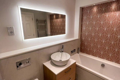 This is an example of a contemporary bathroom in Surrey.