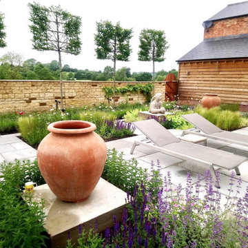 Walled country garden - natural stone walls & paving & planting design