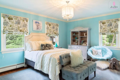 Bedroom - mid-sized transitional guest carpeted and gray floor bedroom idea in New York with blue walls
