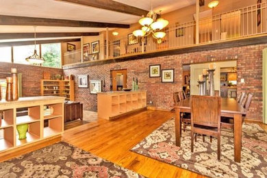 Mid-century modern dining room photo in Other