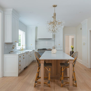 Château Charm: French-Inspired Kitchen Renovation with Plaster Hood Blue Stove a